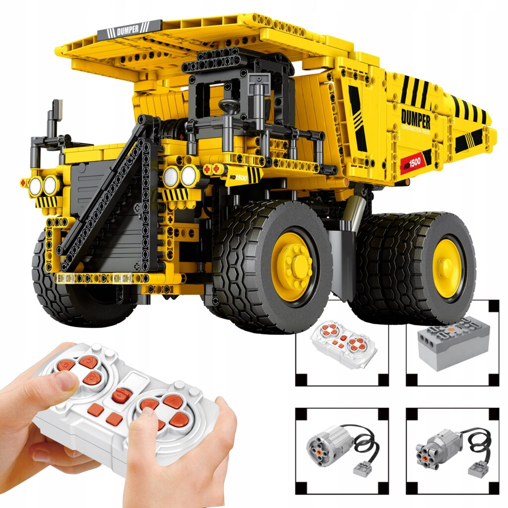 Duży, żółty model zdalnie sterowanej wywrotki, złożony z klocków technicznych Reobrix 22025 oraz dodatkami dołączonymi do zestawu do zdalnego sterowania